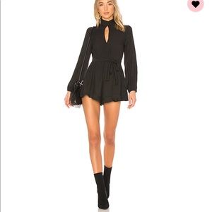 Black romper by Minkpink size small